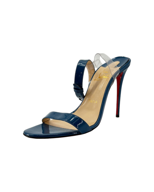 Blue high-heeled sandal with transparent straps on a white background
