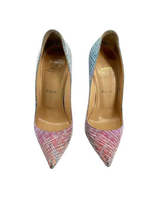 Pair of multicolored high-heeled shoes with brand logo on a white background