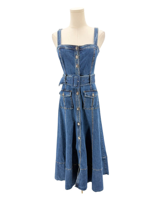 Blue denim dress on a mannequin against a white background
