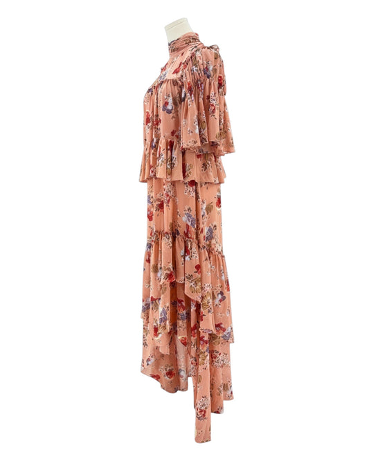 Floral dress on a mannequin against a white background