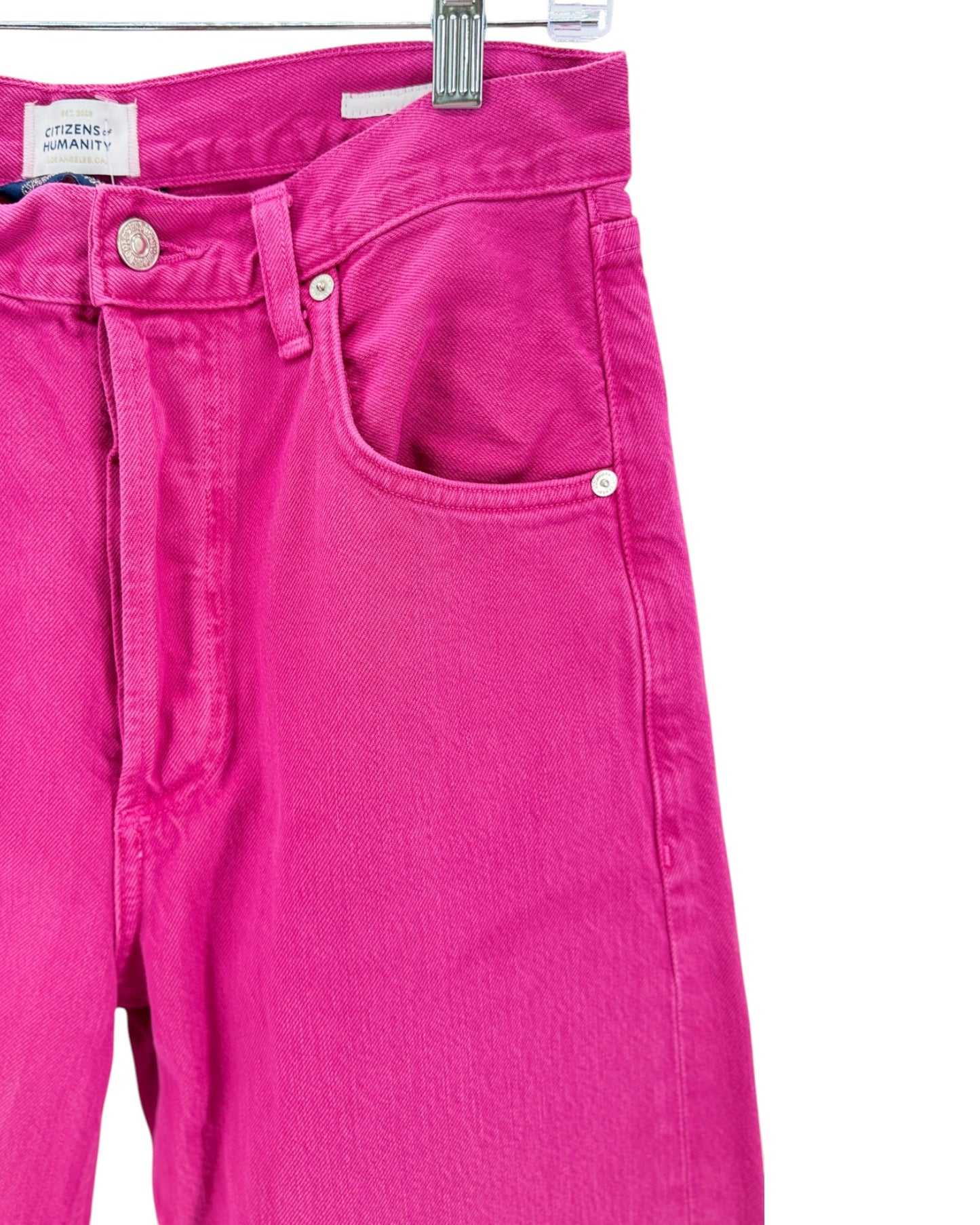 Bright pink pants on a white background