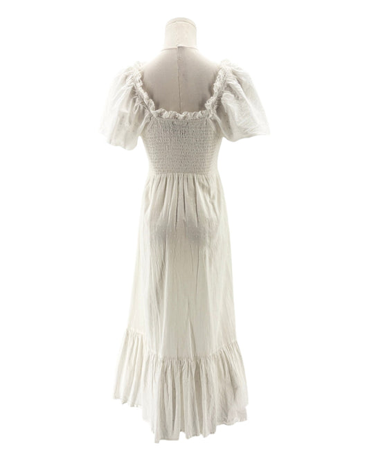 White dress on a mannequin against a white background
