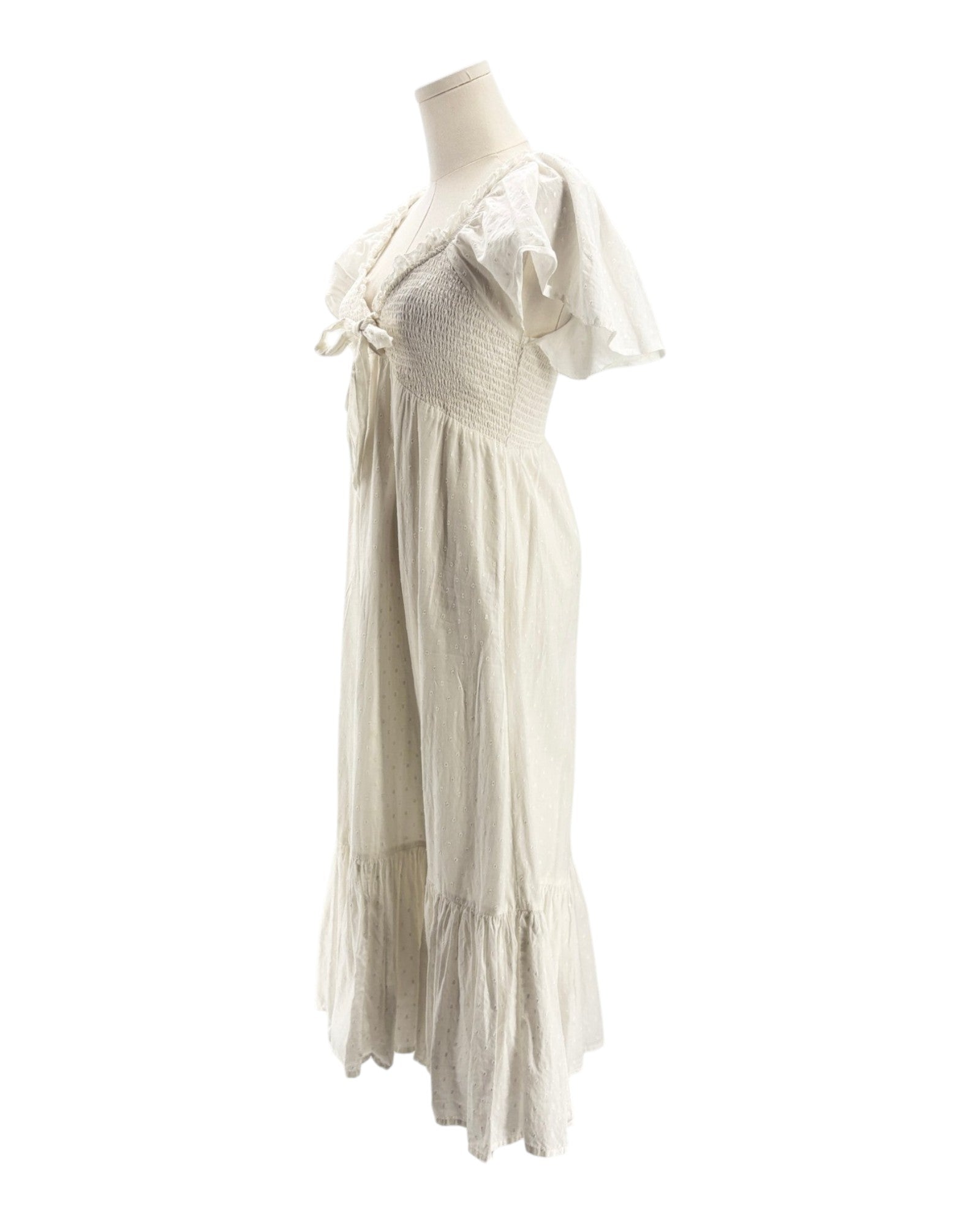 White dress on a mannequin against a white background