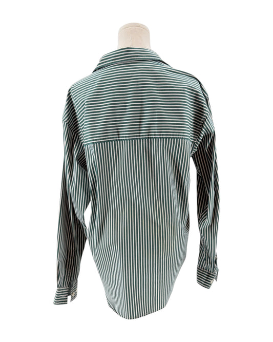 Green and white striped shirt on a mannequin against a white background
