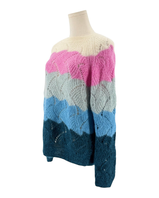 Striped colorful long sleeve sweater on a mannequin on a white background