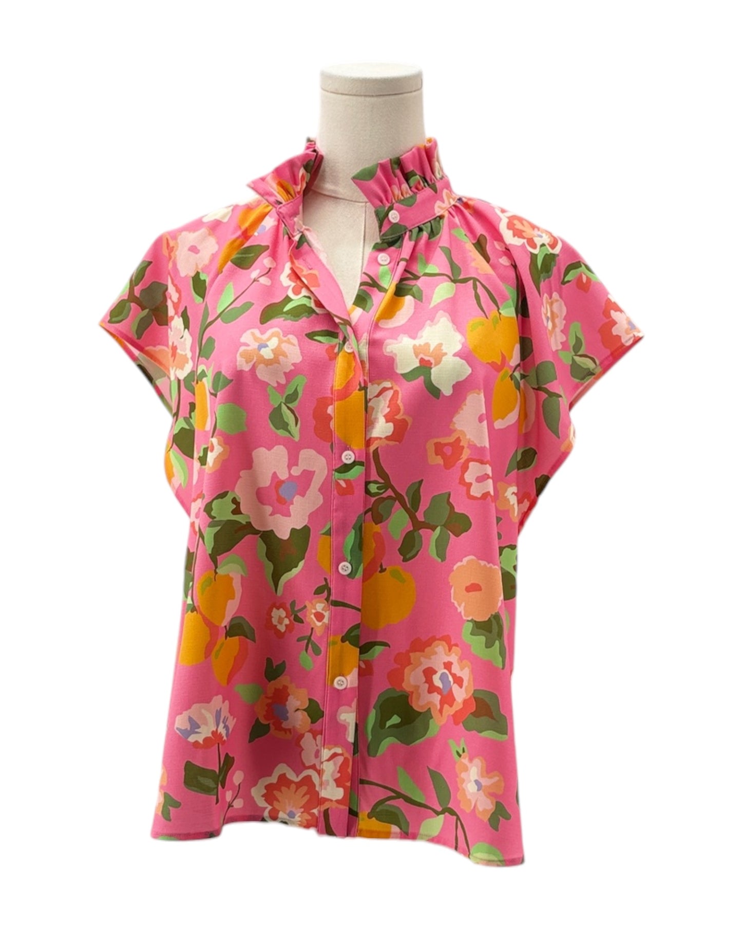 Pink floral blouse on a mannequin against a white background