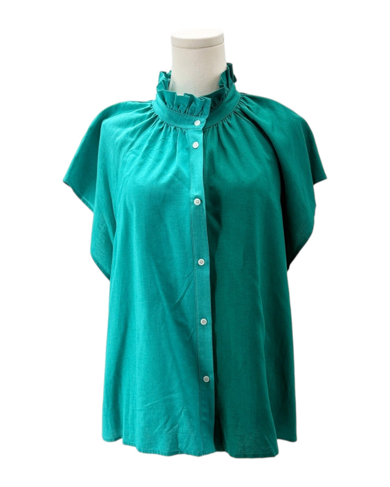 Teal blouse on a mannequin against a white background
