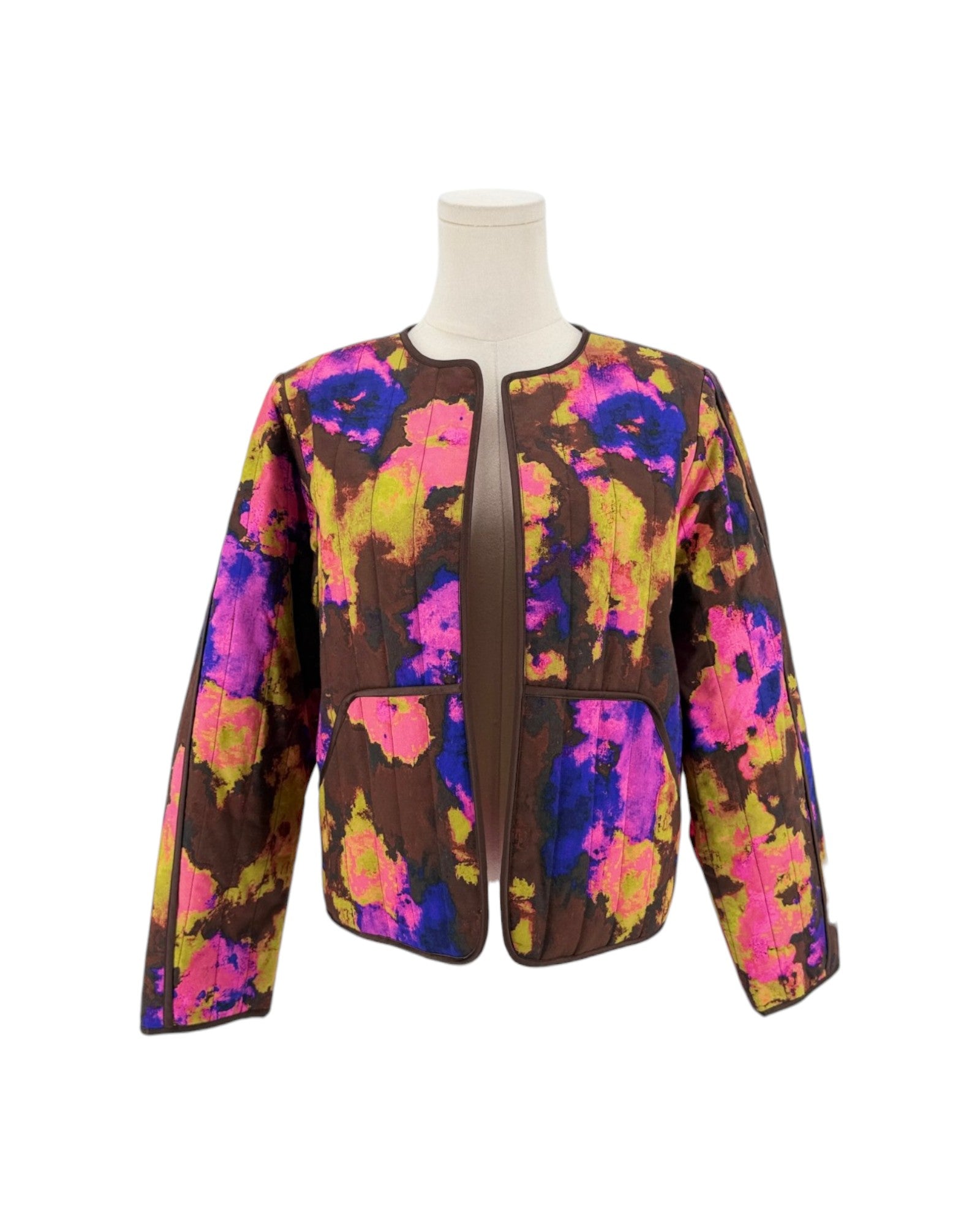 Abstract multi-color quilted long sleeve jacket on a white background