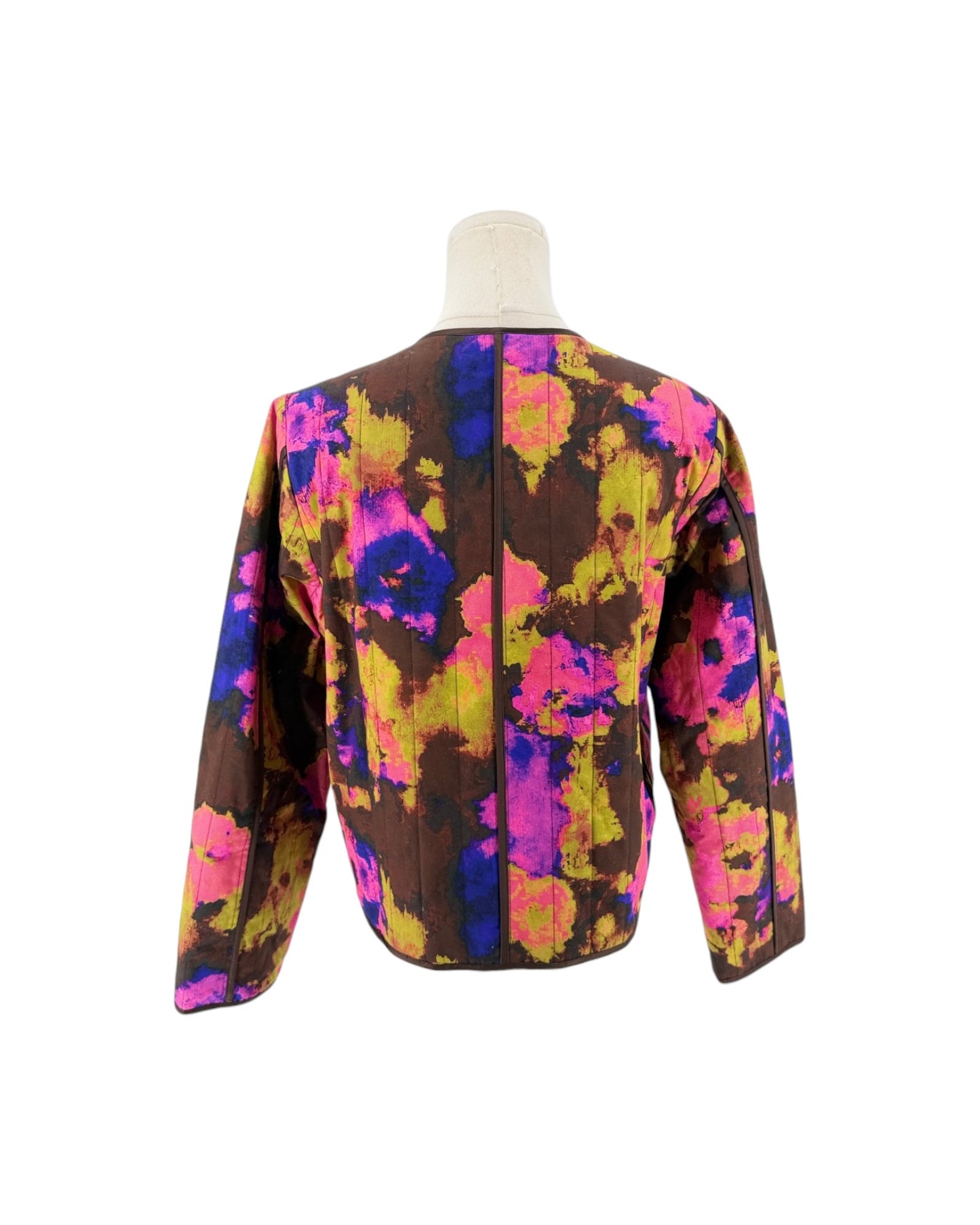 Abstract multi-color quilted long sleeve jacket on a white background