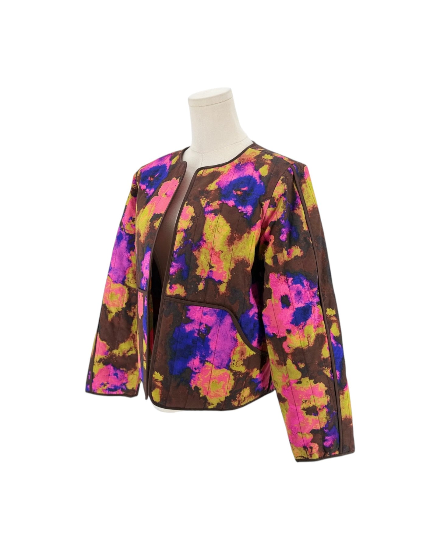 Abstract multi-color quilted long sleeve jacket on a white background