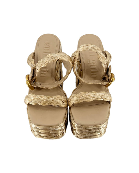 A pair of women's platform wedge sandals with woven straw straps and gold-tone buckle details, shown from a top-down view on a white background.
