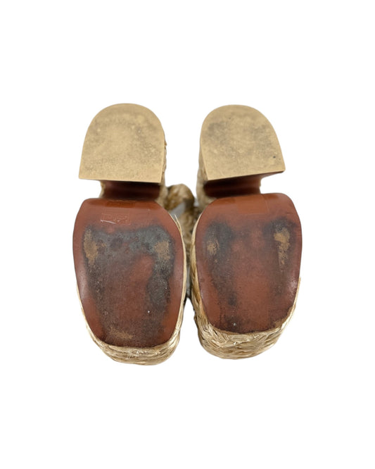A pair of vintage gold-tone slide sandals with reddish-brown leather uppers, shown from a top-down view on a white background.