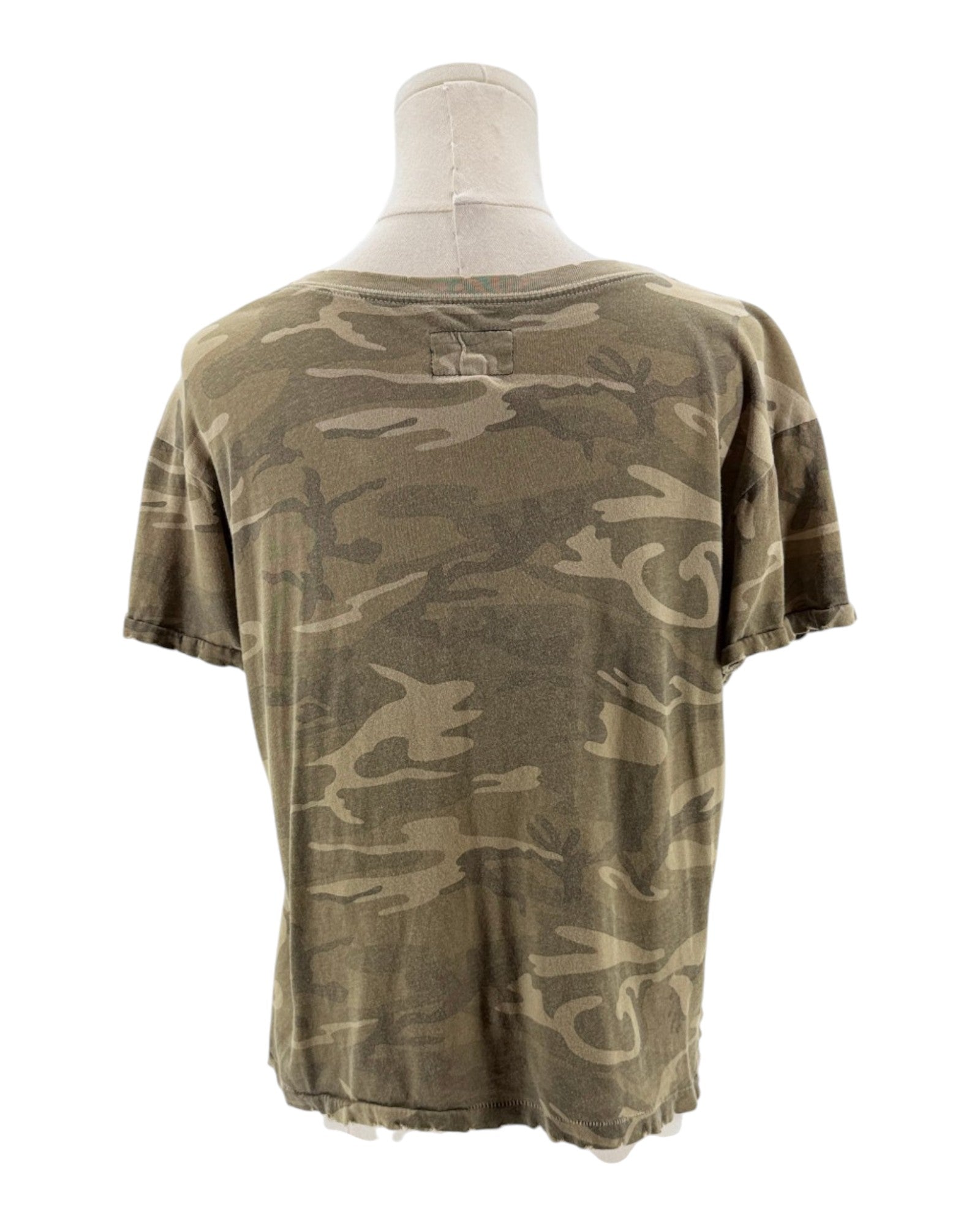 Camouflage t-shirt on a mannequin against a white background