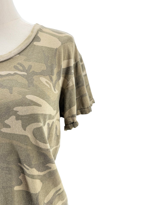 Camouflage-patterned shirt on a mannequin against a white background