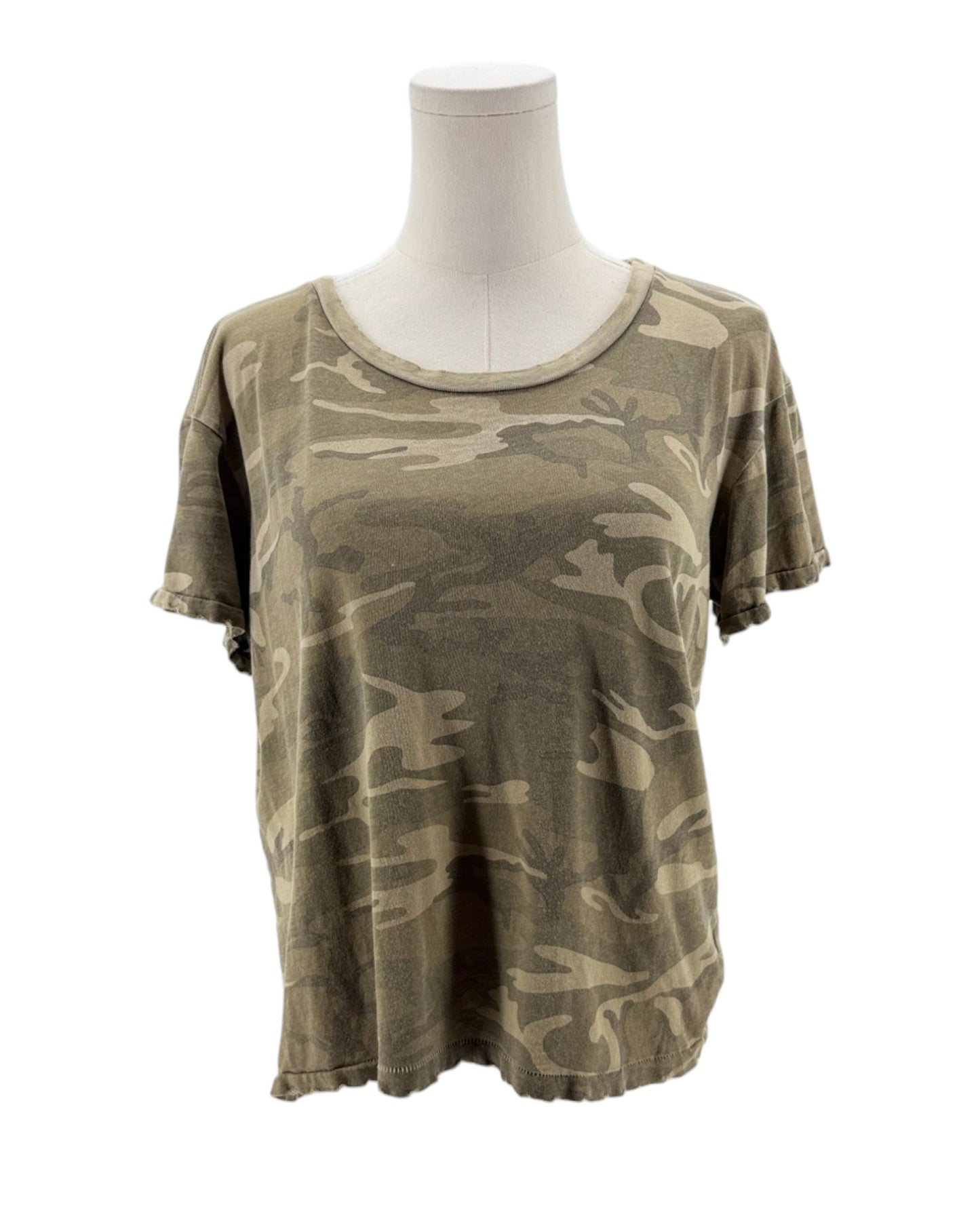 Camouflage t-shirt on a mannequin against a white background