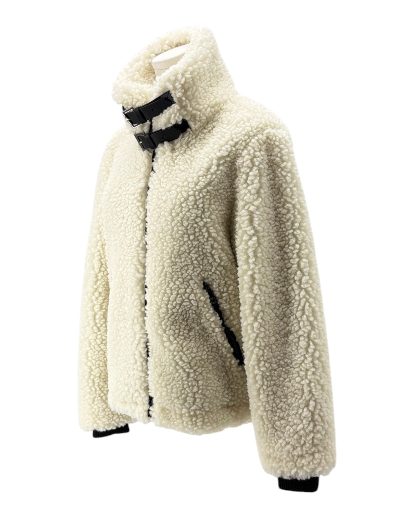 White sherpa jacket with black accents on a white background
