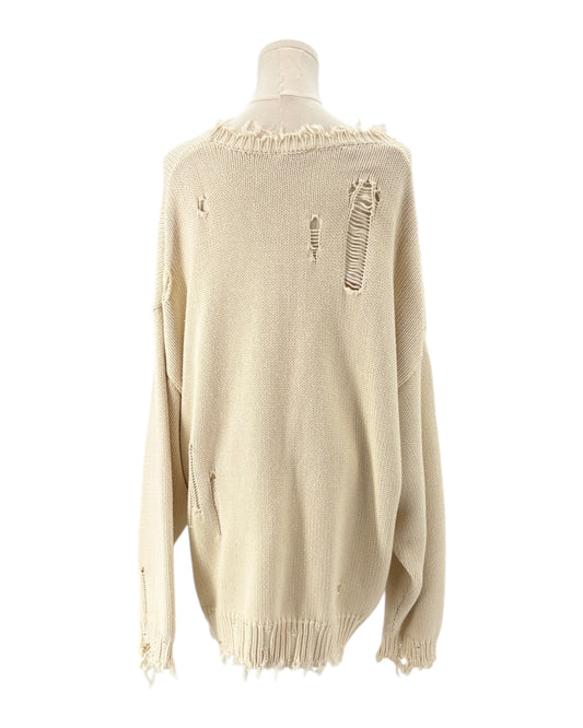 Denimist beige sweater with an American flag design on a mannequin against a background