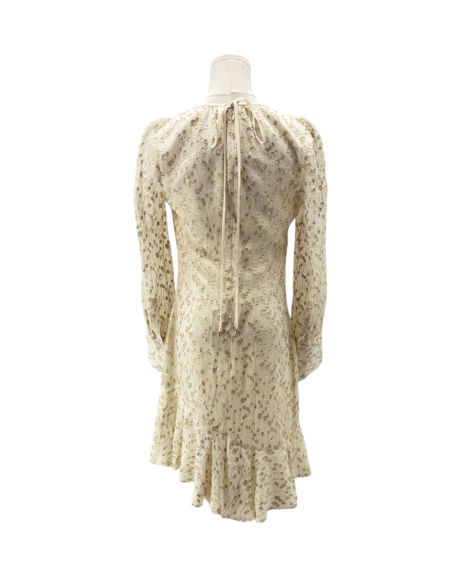 White dress on a mannequin against a white background