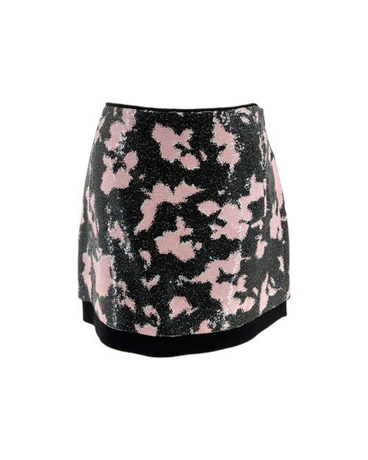 Black skirt with pink floral pattern on a white background