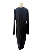Black dress on a mannequin against a white background