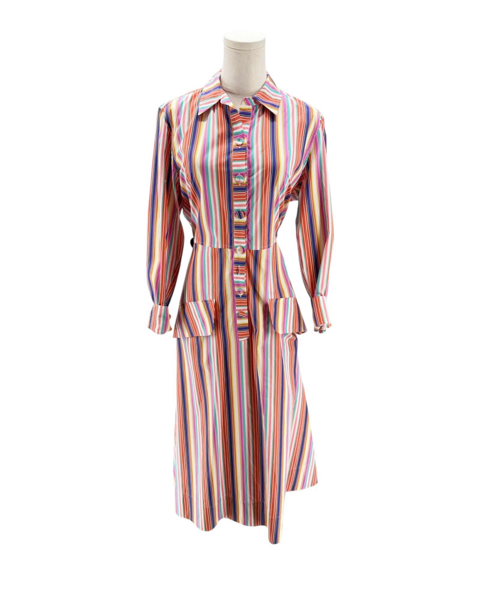 Multicolored striped dress on a mannequin against a white background