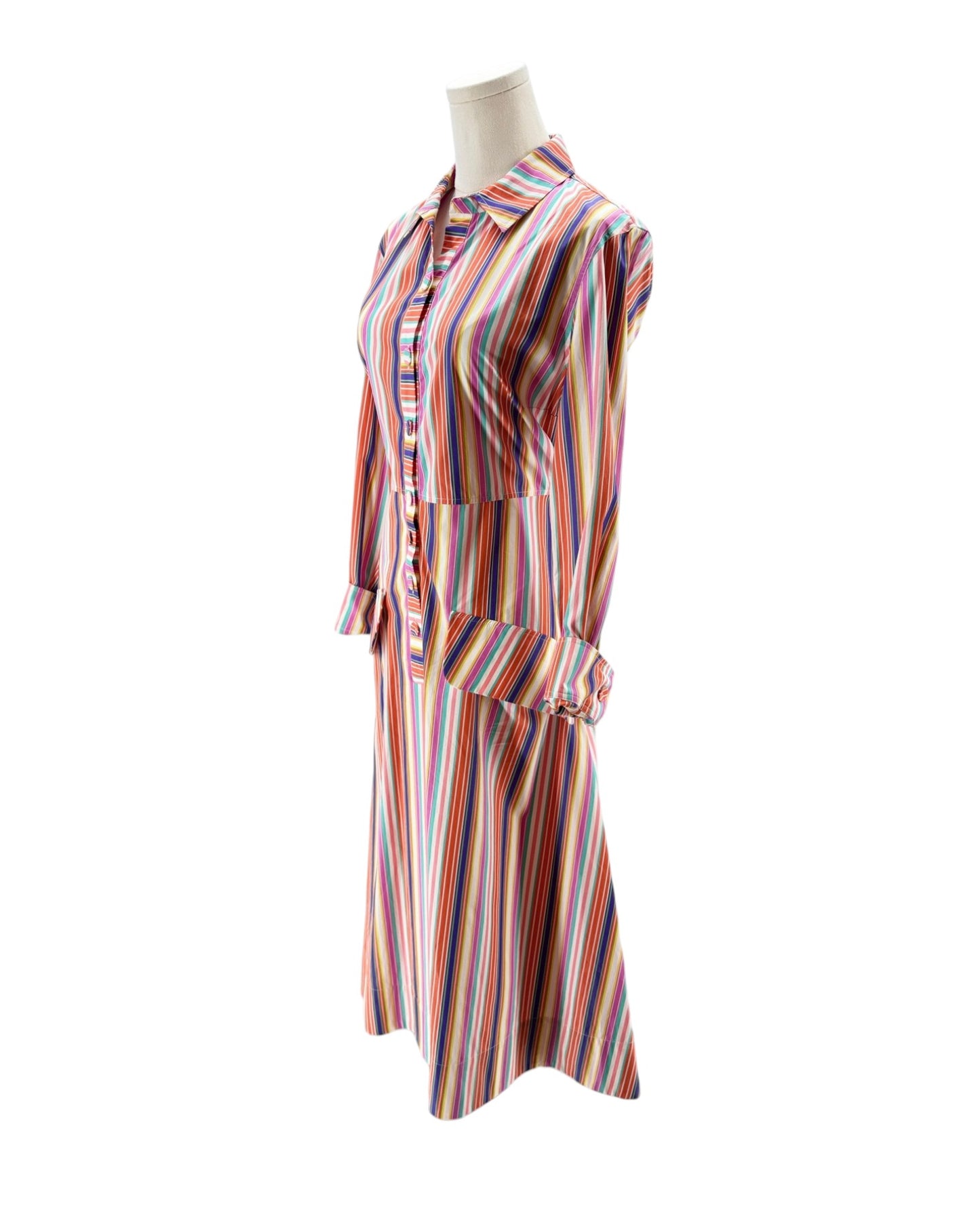 Multicolored striped dress on a mannequin against a white background