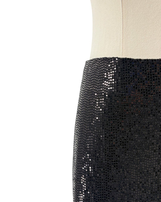 Black sequin skirt on a white background