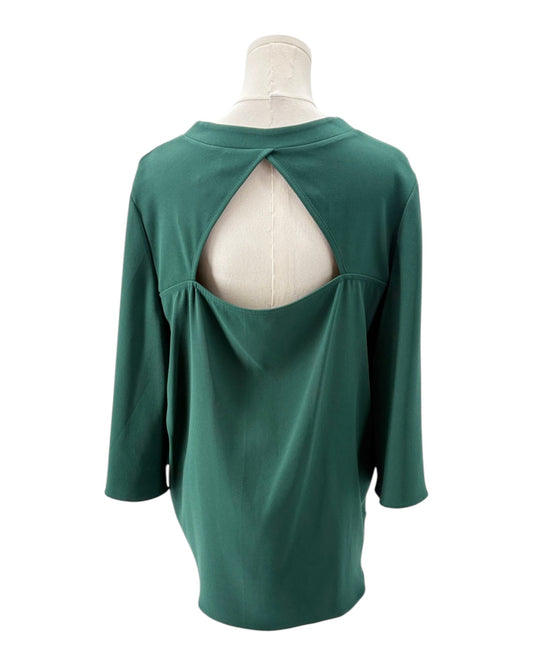 Green long-sleeve top on a mannequin with a white background