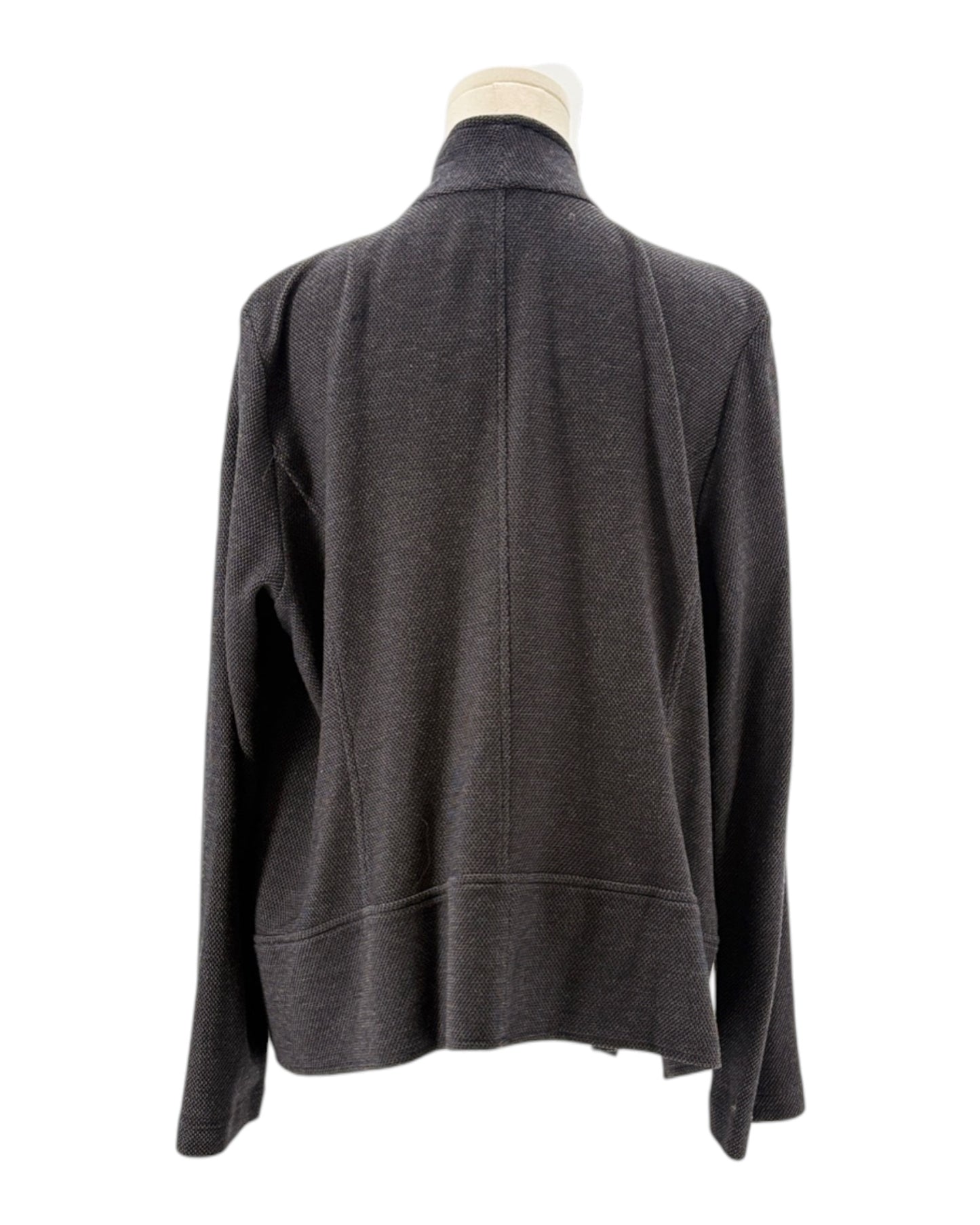 Gray sweater on a mannequin against a white background