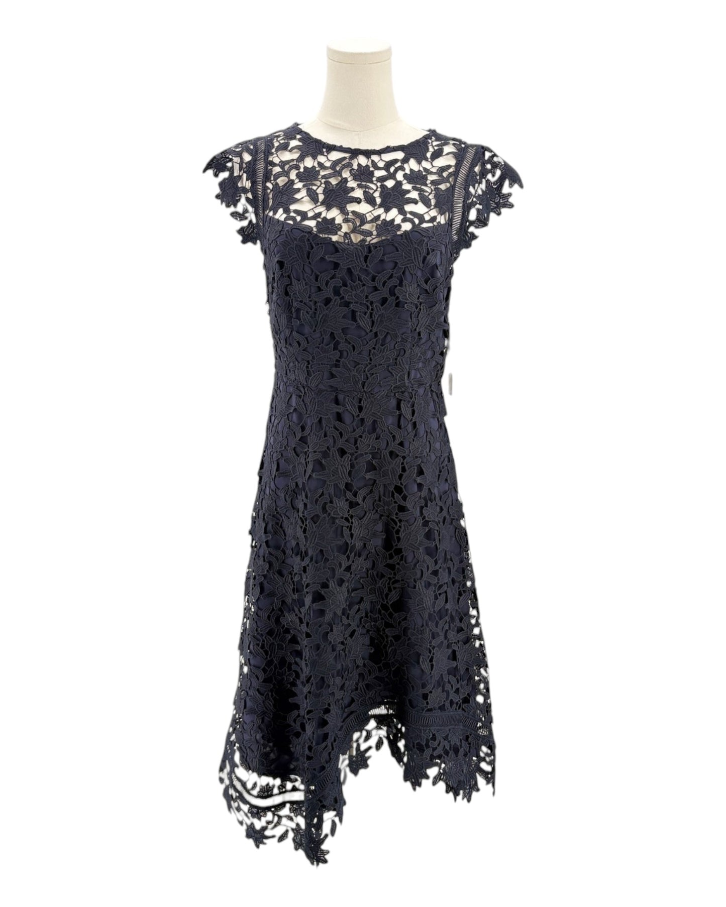 navy lace dress on a mannequin against a white background