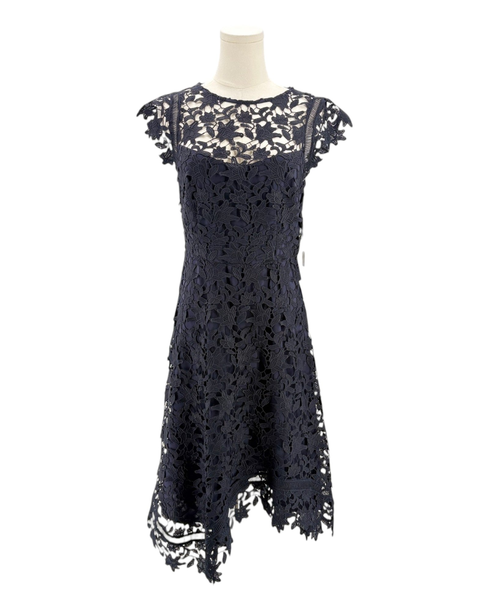 navy lace dress on a mannequin against a white background