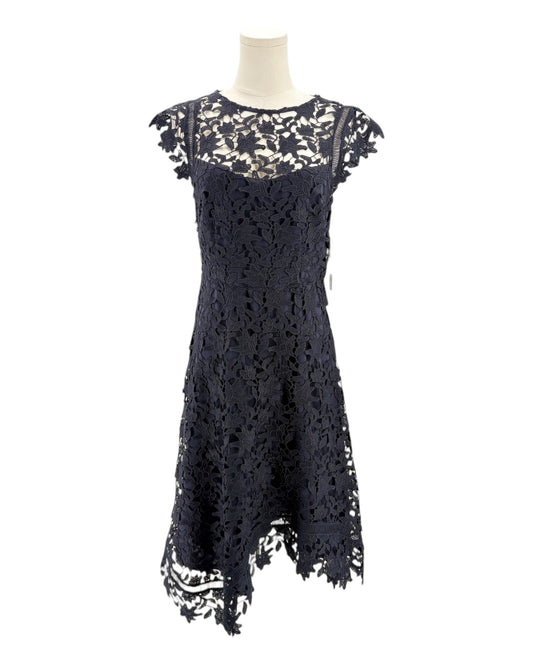 navy lace dress on a mannequin against a white background