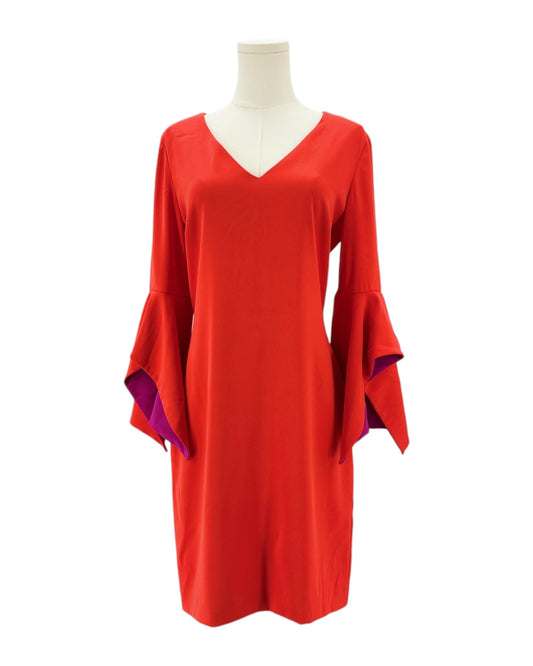 Red dress on a mannequin against a white background