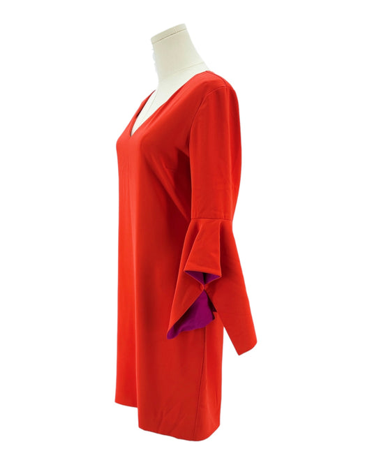 Red dress on a mannequin against a white background