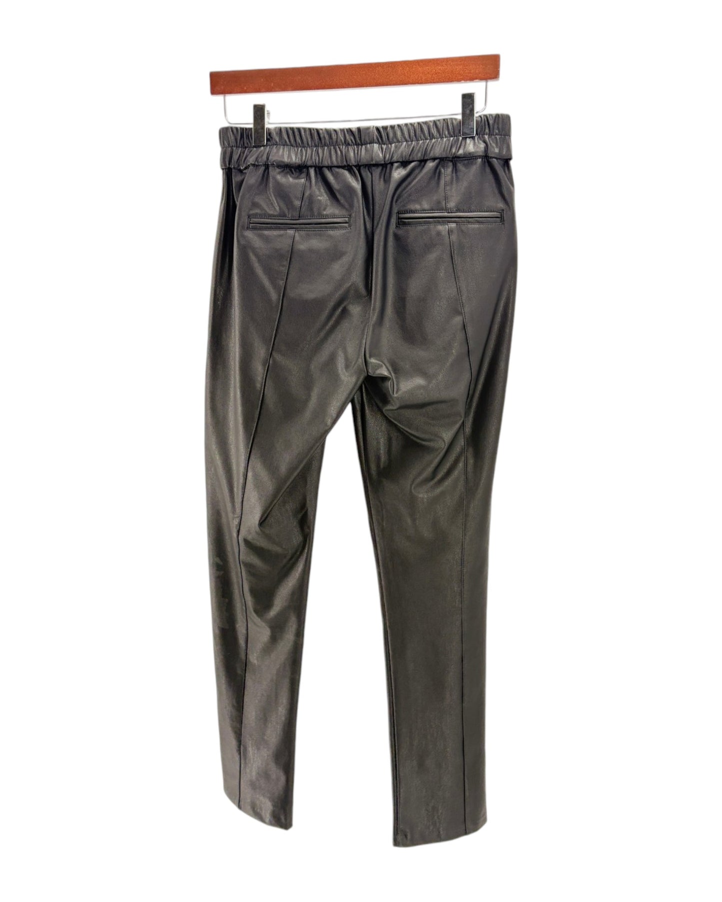 blackpants on a hanger against a white background