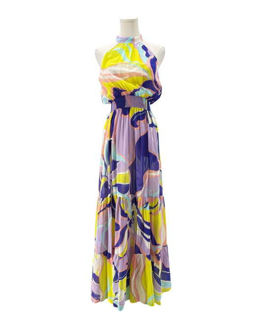 Colorful dress on a mannequin against a white background