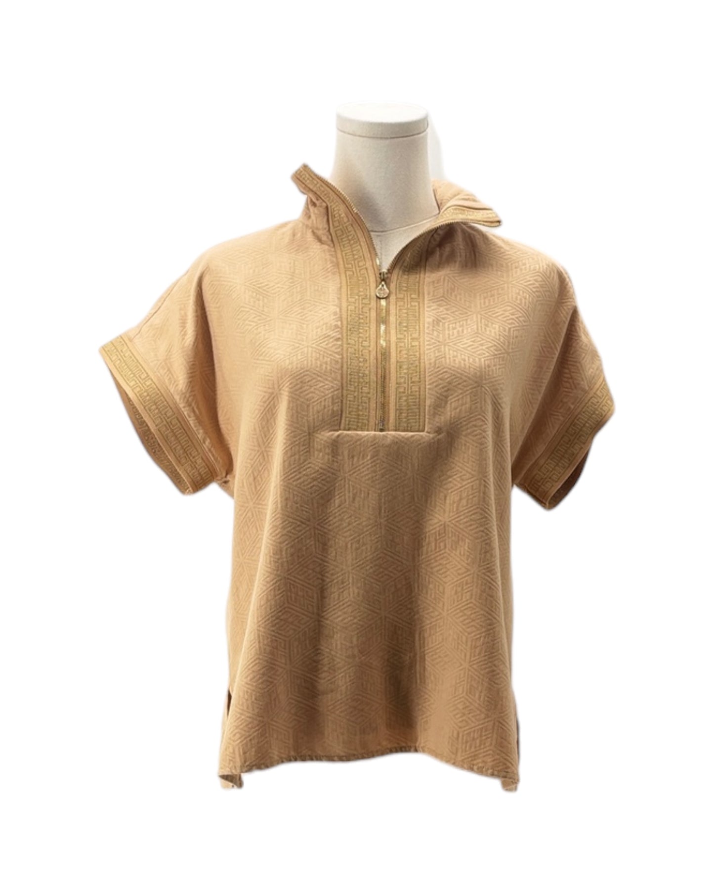 Gold short-sleeve shirt on a mannequin against a white background