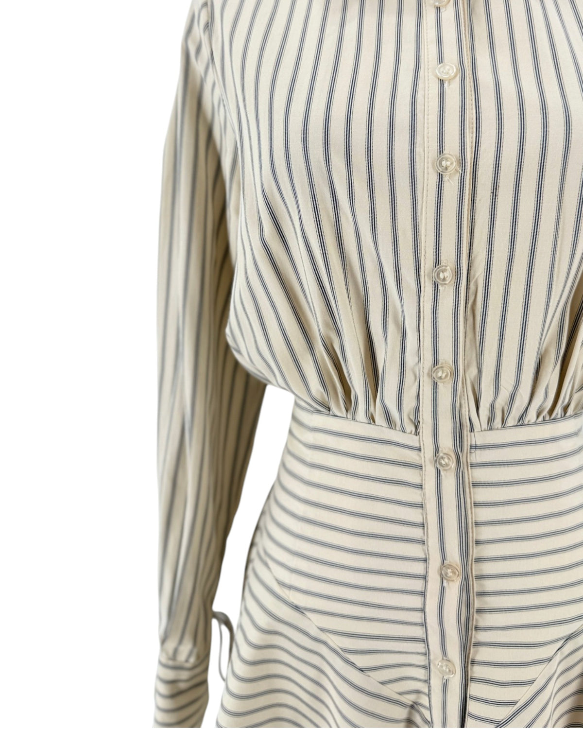 Striped shirt dress, point collar, clean button-front placket closure, distinct smocked and gathered detailing, long sleeves detailed with adjustable drawstring/tie accent at cuffs on a mannequin on a white background