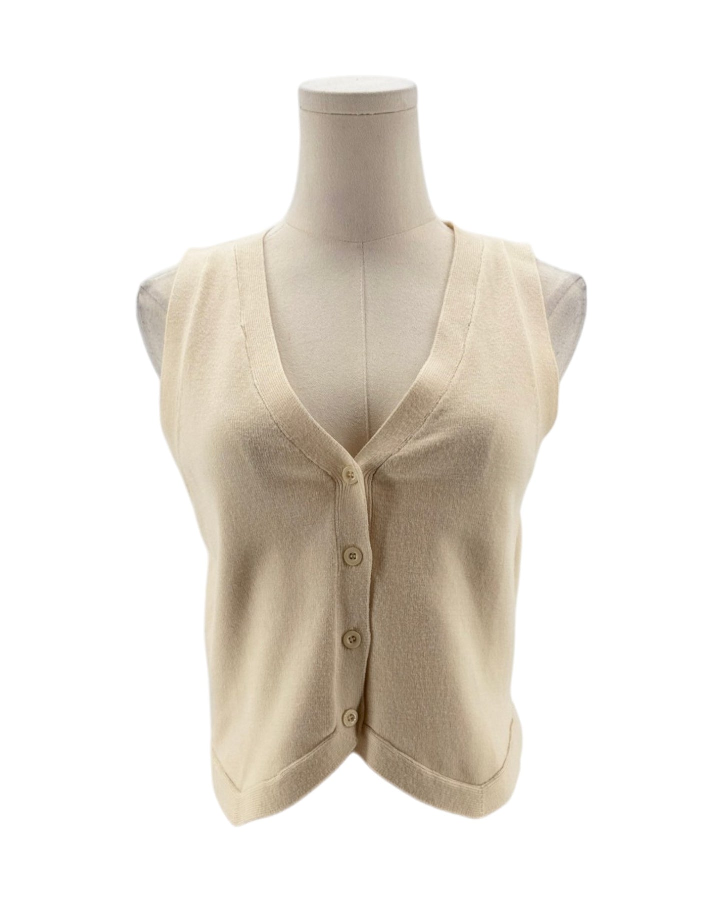 Beige knit vest on a mannequin against a white background