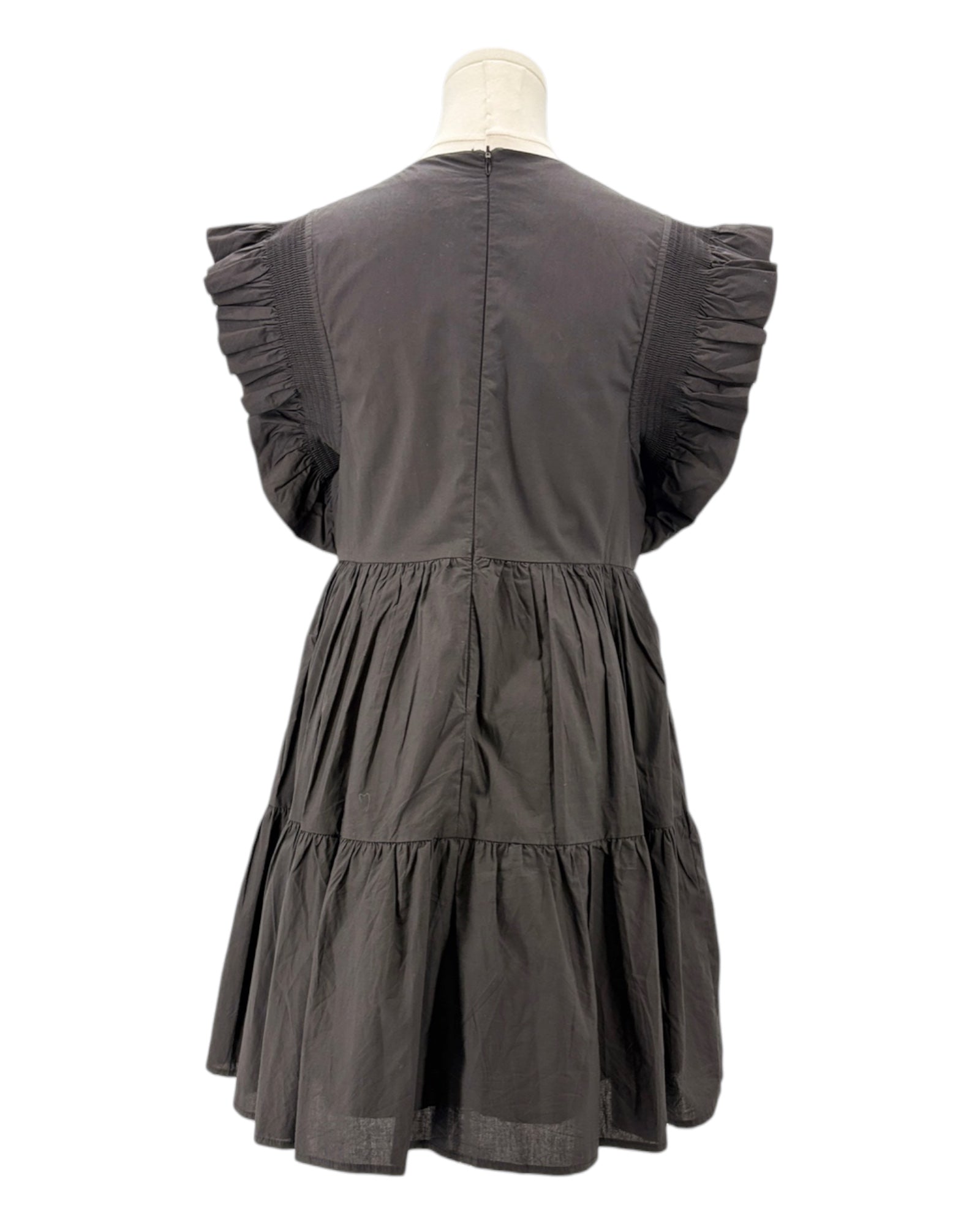 Black dress with ruffled sleeves on a mannequin against a white background