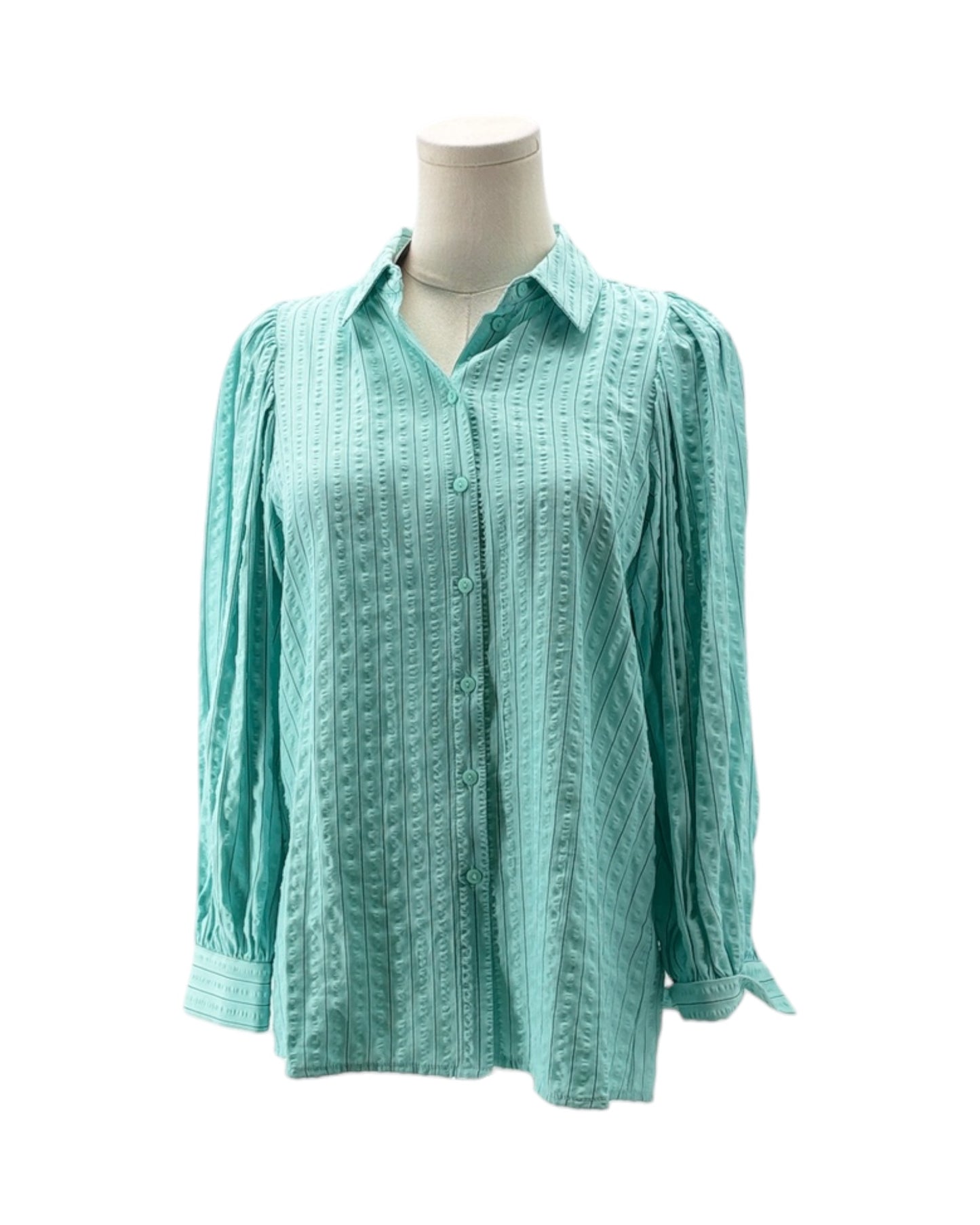 Light blue textured blouse on a mannequin against a white background