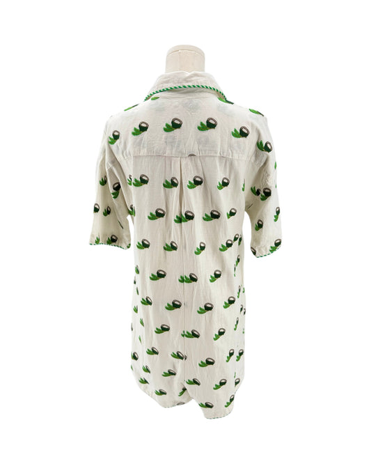 White shirt with green pattern on a white background