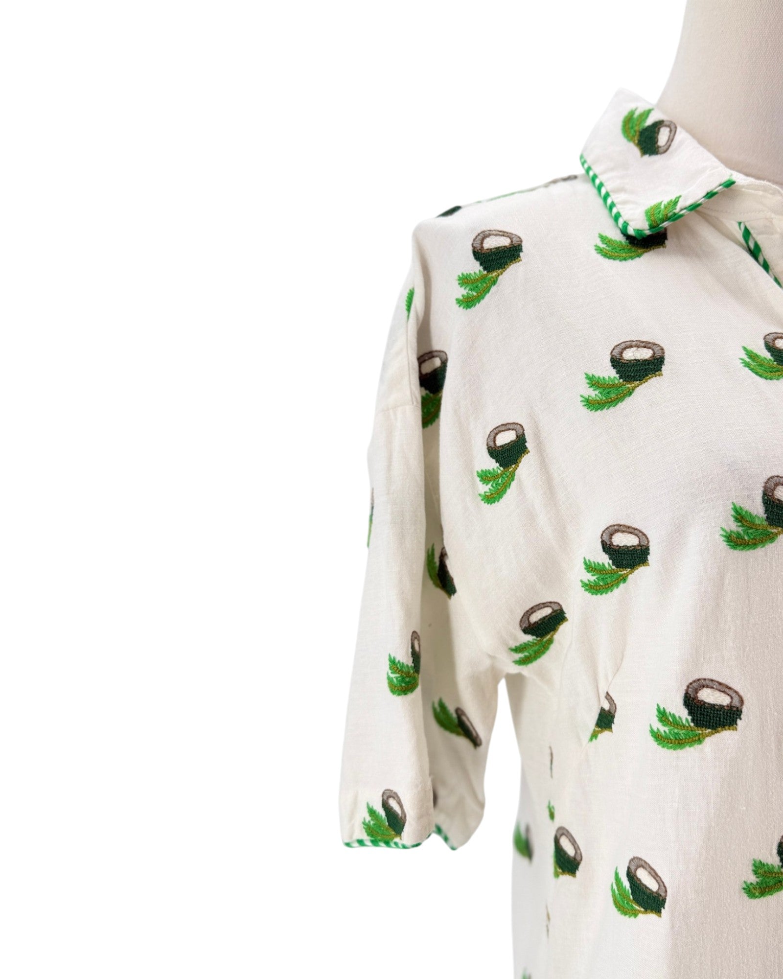 White shirt with coconut pattern on a white background