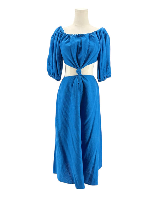 Blue dress on a mannequin against a white background