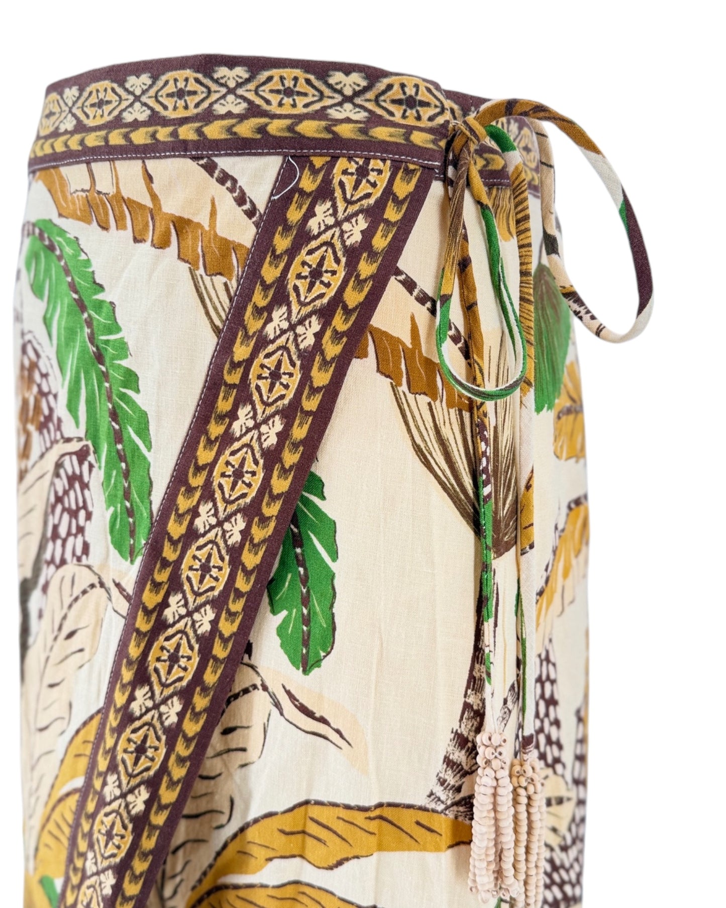 Tropical patterned skirt with drawstring waist on a white background