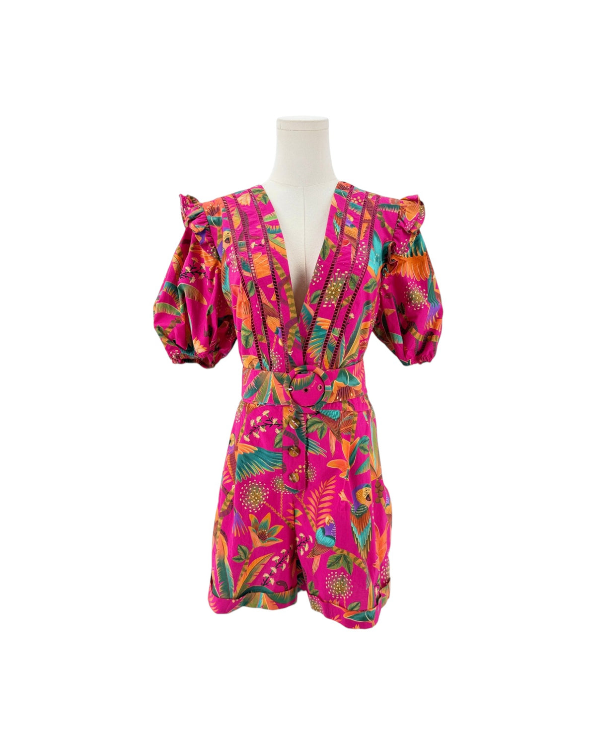 Floral and tropical birds printed deep v neck short puff sleeve romper on a mannequin on a white background