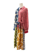 Mannequin wearing a colorful outfit with patterned clothing on a white background