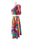 Colorful striped skirt and top on a mannequin against a white background