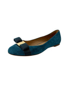 Suede flat shoe on a white background