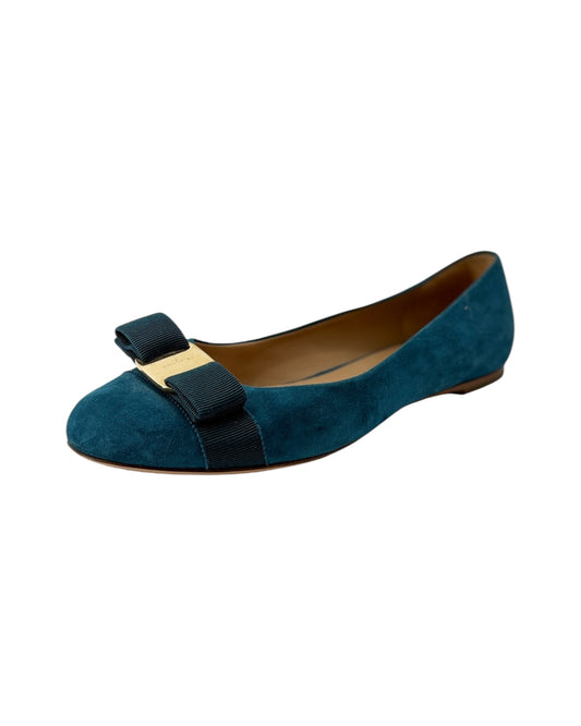 Suede flat shoe on a white background